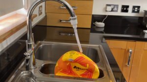 How to Fill a Football With Water (Step-by-Step Guide)
